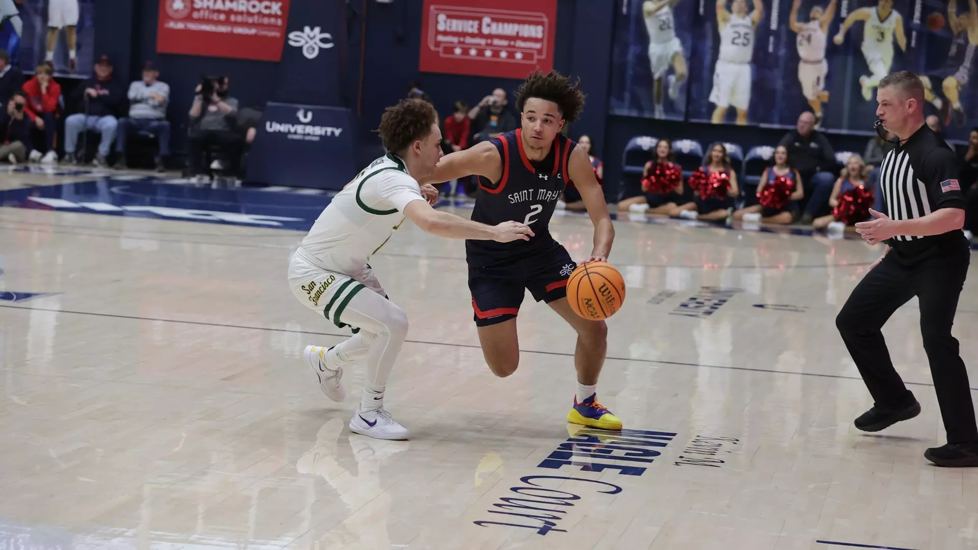 Men's Basketball player Jordan Ross drives against USF in January 2025