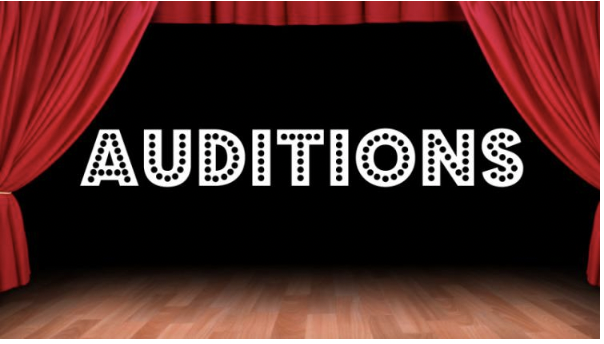 Auditions sign with a red theatre curtain on a stage