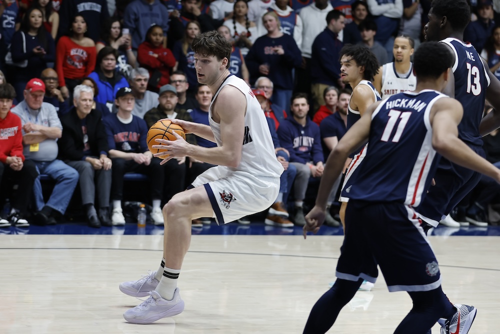 men's basketball player Harry Wessels drives against Gonzaga on February 1, 2025