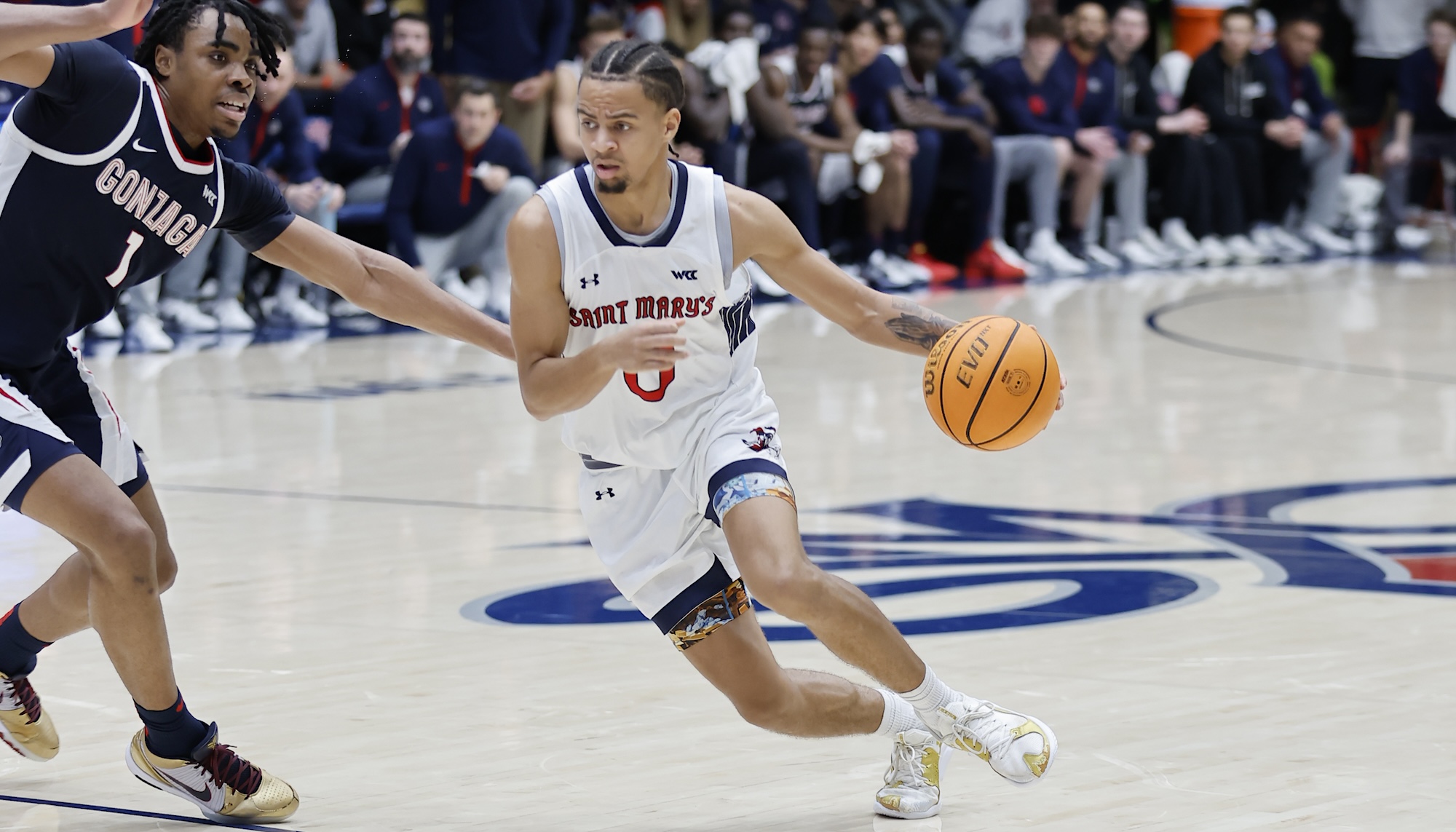 Men's basketball player Mikey Lewis drives against Gonzaga on February 1, 2025