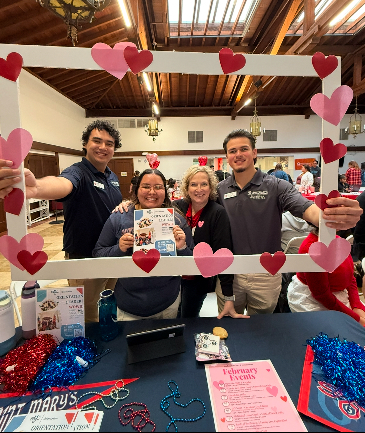 SMC students Brandon Valerio, Lulu Hernandez, and Victor Flores with Executive Director for Student Activities & Engagement, Jennifer Herzog, at the Spring 2025 Student Involvement Fair