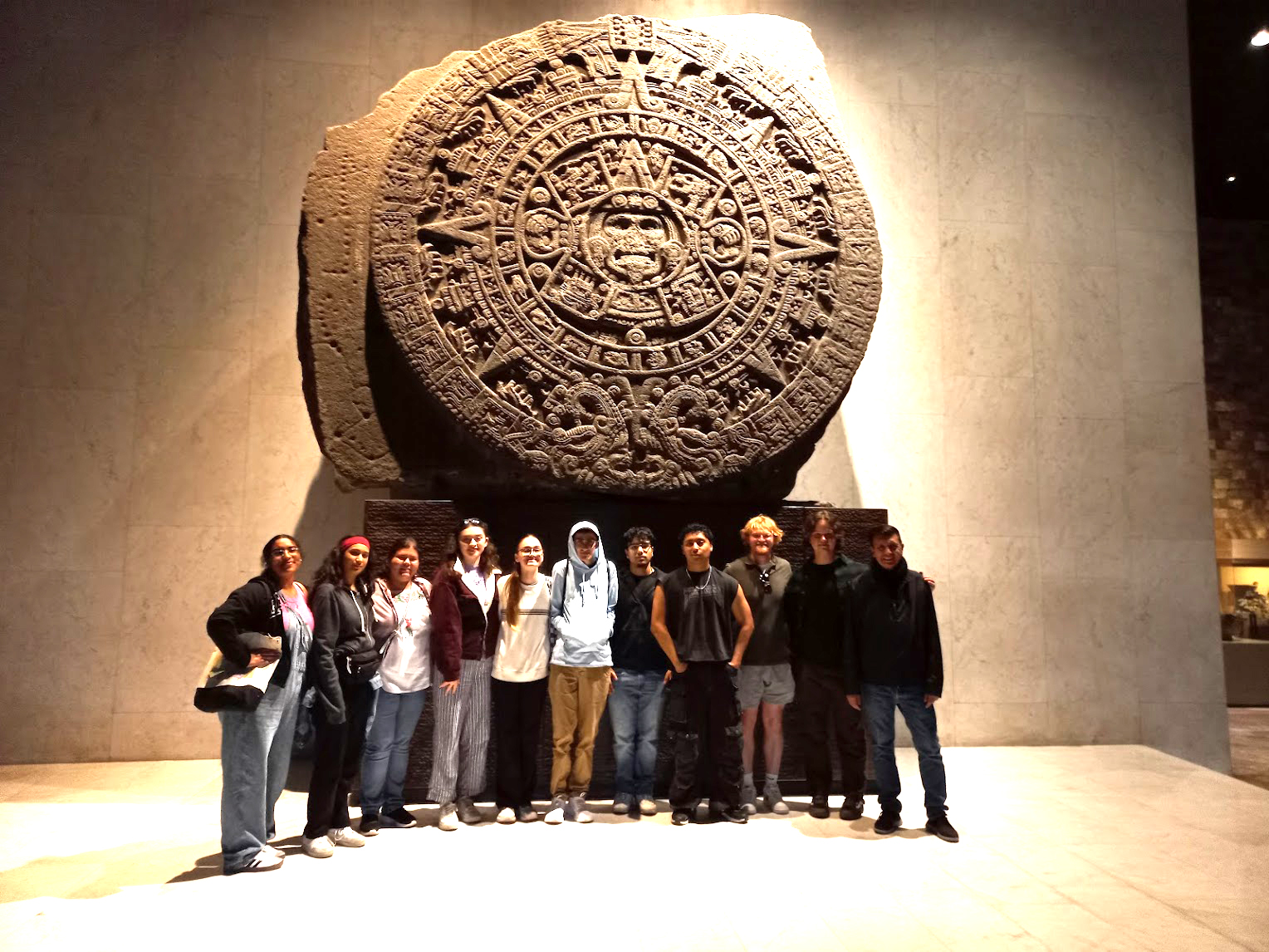 Students in front of Mayan calendar