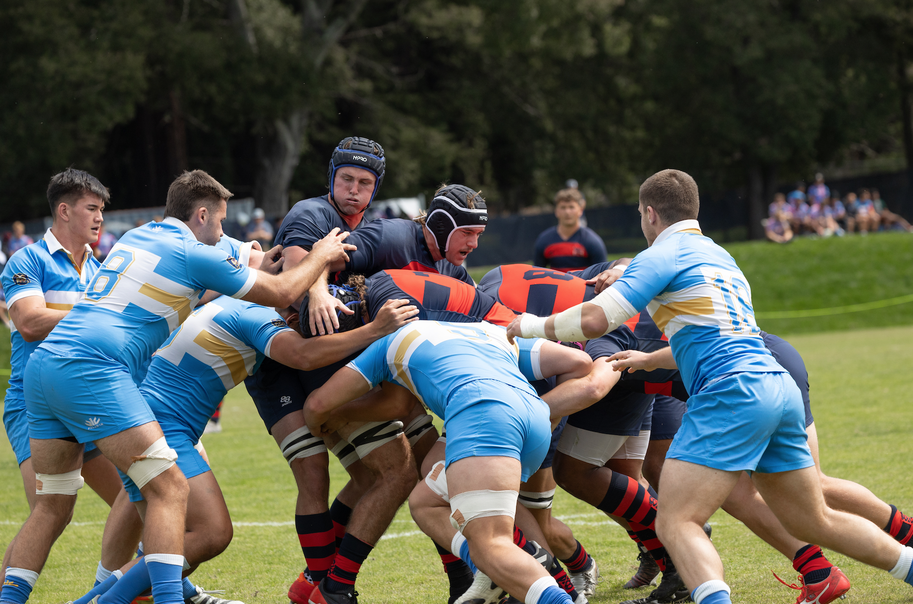 Men's Rugby push the ball forward during a maul