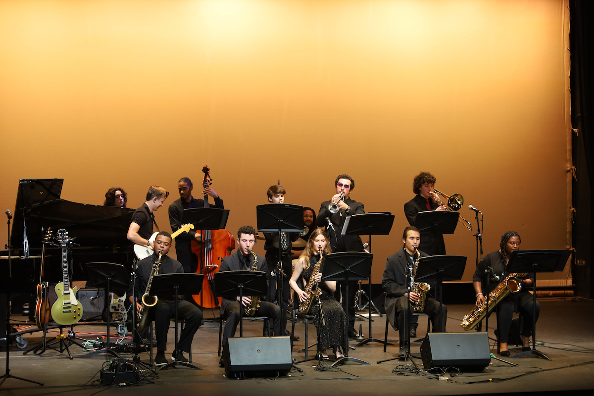 SMC Jazz Band performing on stage dressed in formal black.