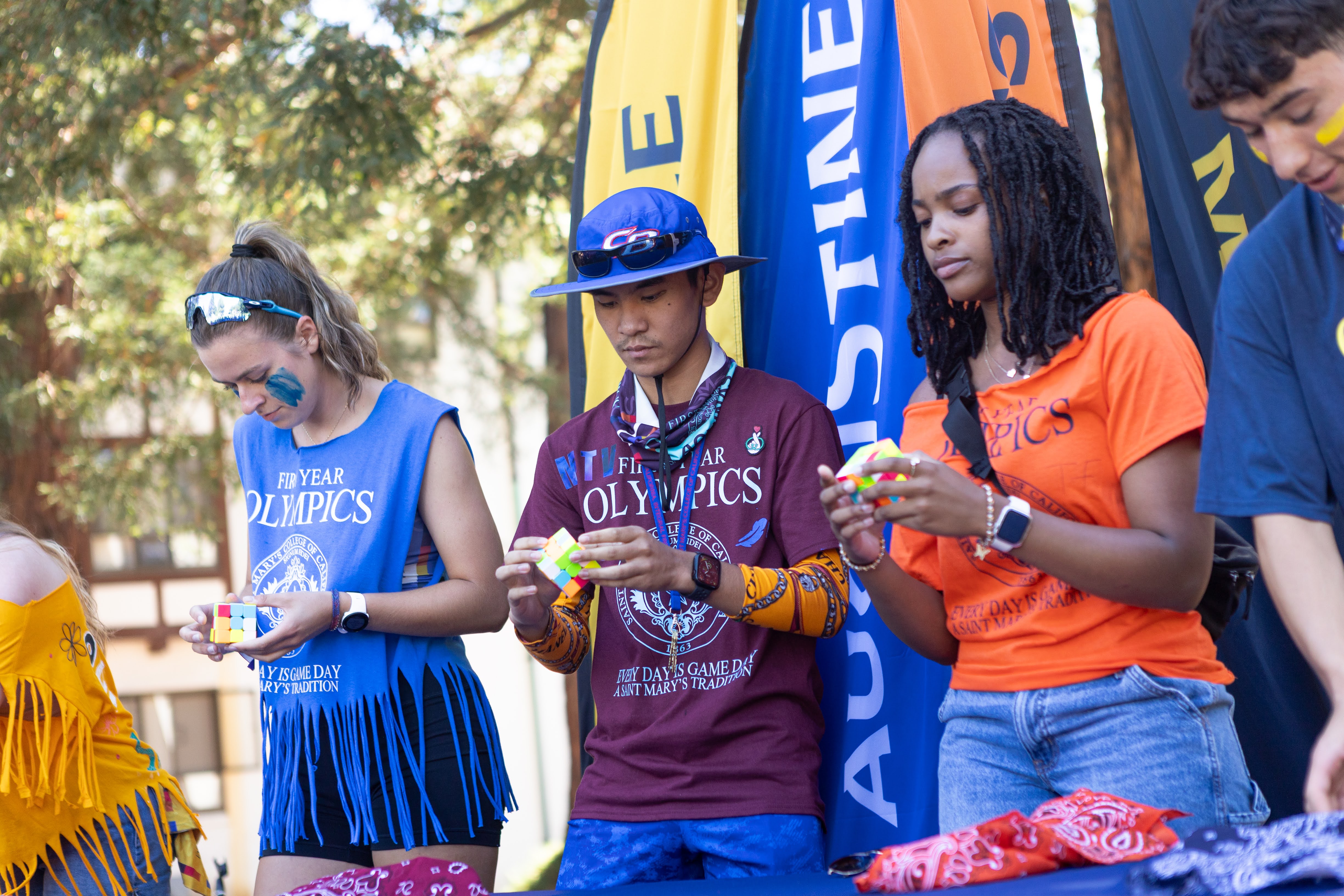 It’s a Pattern: Marc Thomas Valdez ‘29 from Aquinas Hall completes the Rubik’s cube puzzle before his competitors during the First Year Olympics and shares that solving the puzzles is just a repetitive pattern. / Photo by Rebecca Harper