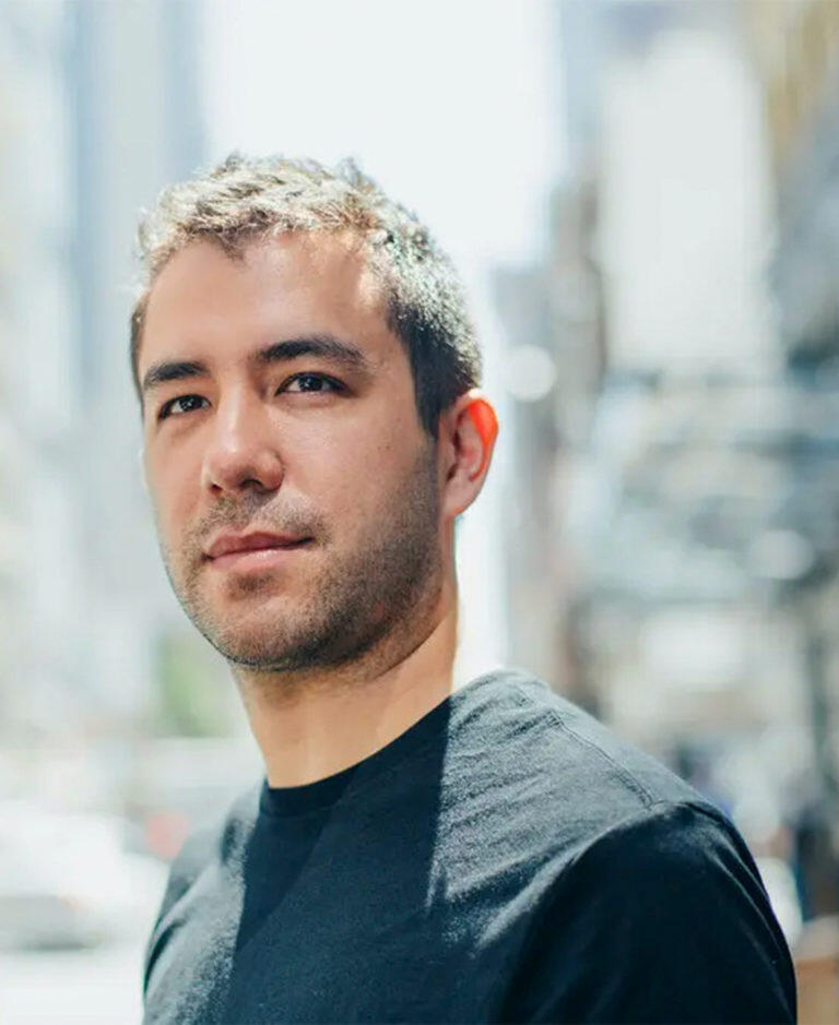 a headshot of a young playwright Christopher Chen with a black Tshirt