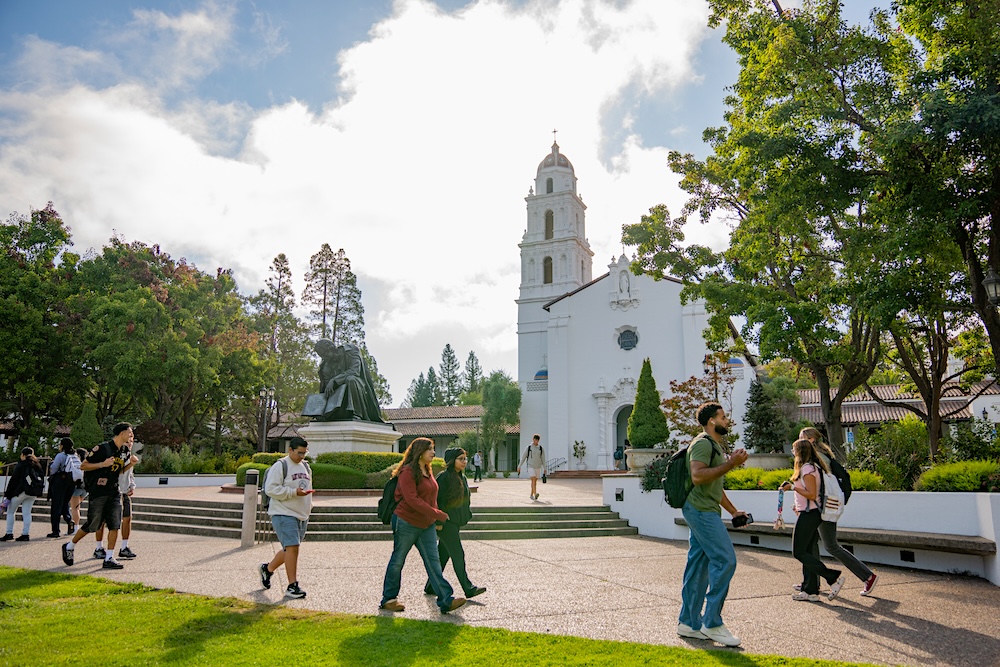 Students walk in front of the Chapel on the first day of classes, Fall 2025