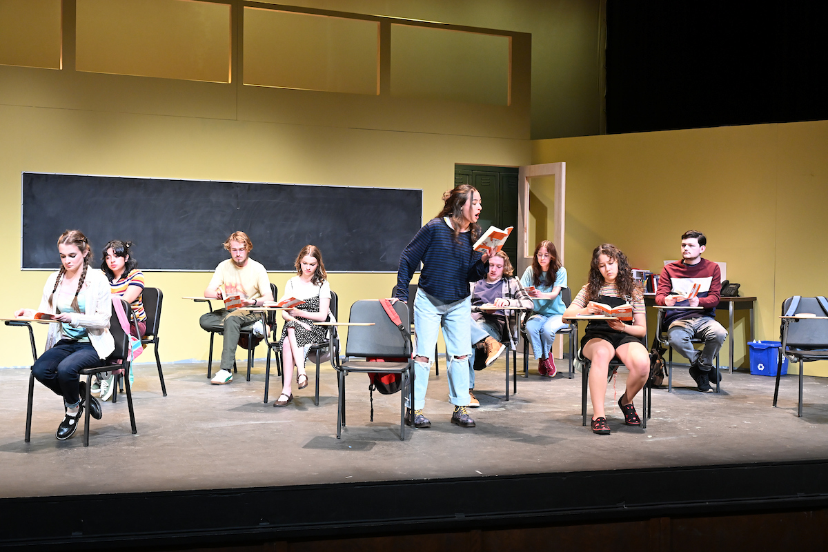 JOHN PROCTOR IS THE VILLAIN set in the classroom with a teacher and students