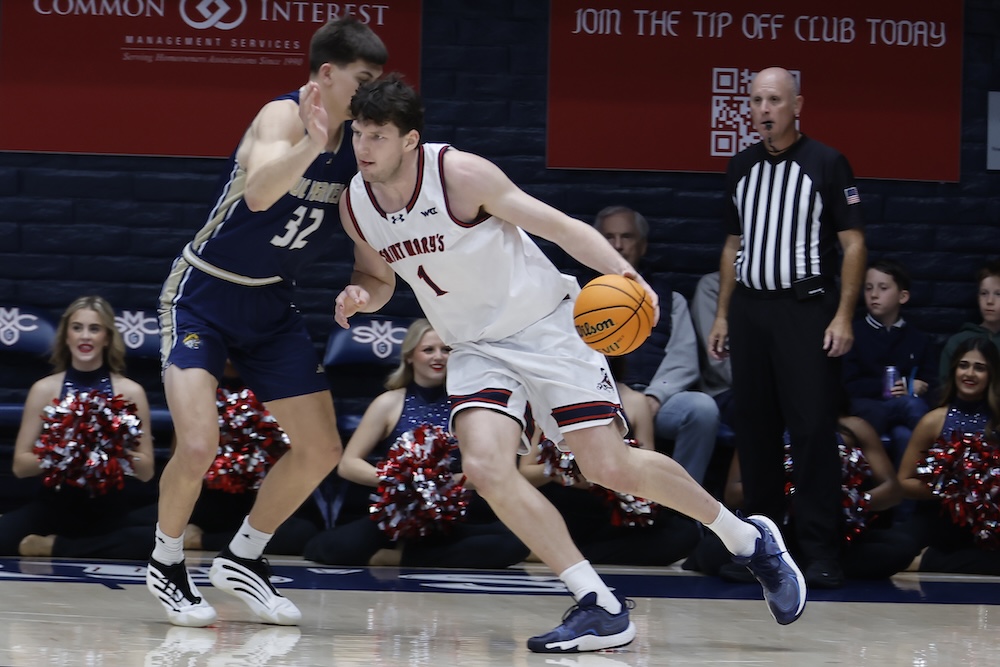 Men's basketball player Harry Wessels drives against UC Merced in November 2025