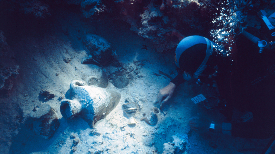 Diver near ancient pottery at Uluburun dive site
