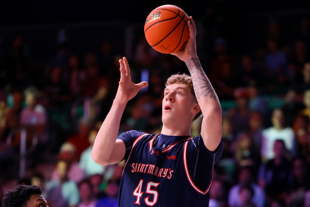 Basketball player Andrew McKeever with the ball in fall 2025