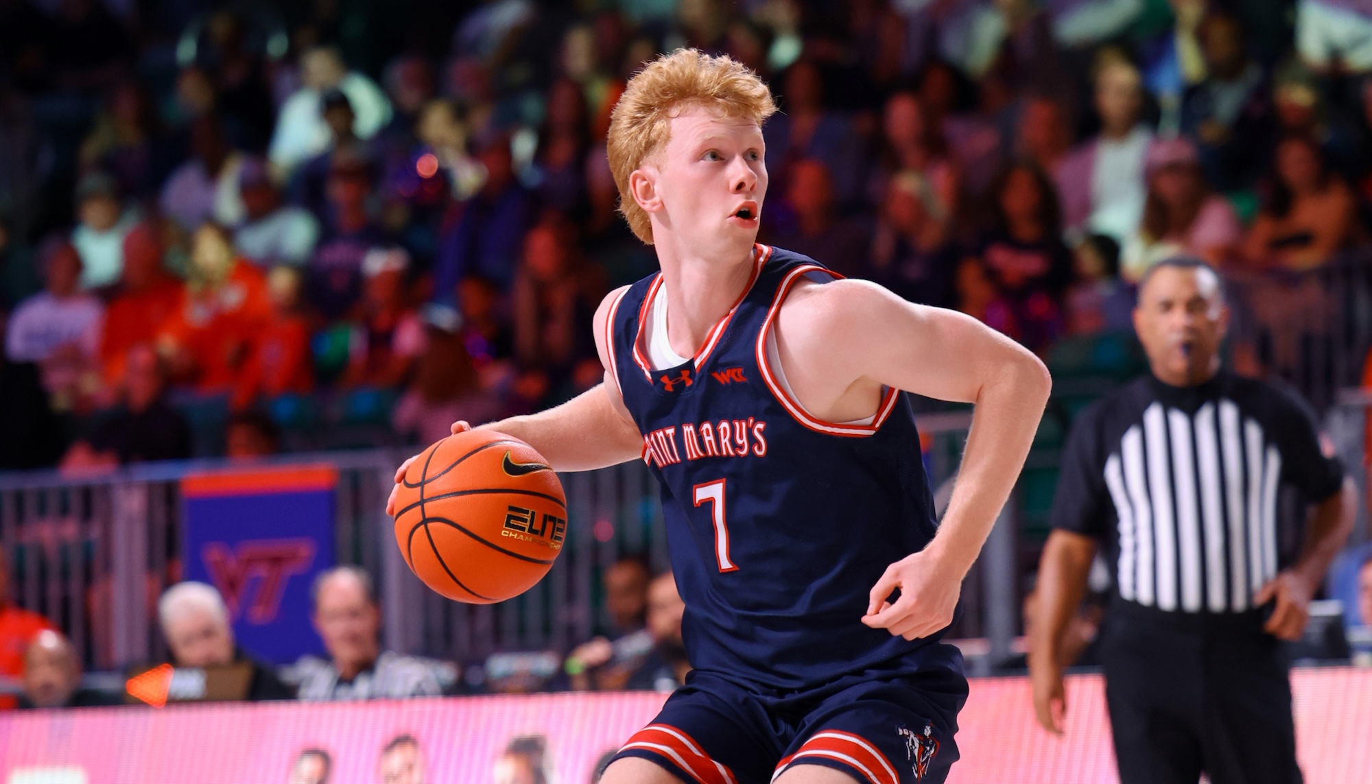 Basketball player Joshua Dent with the ball in fall 2025