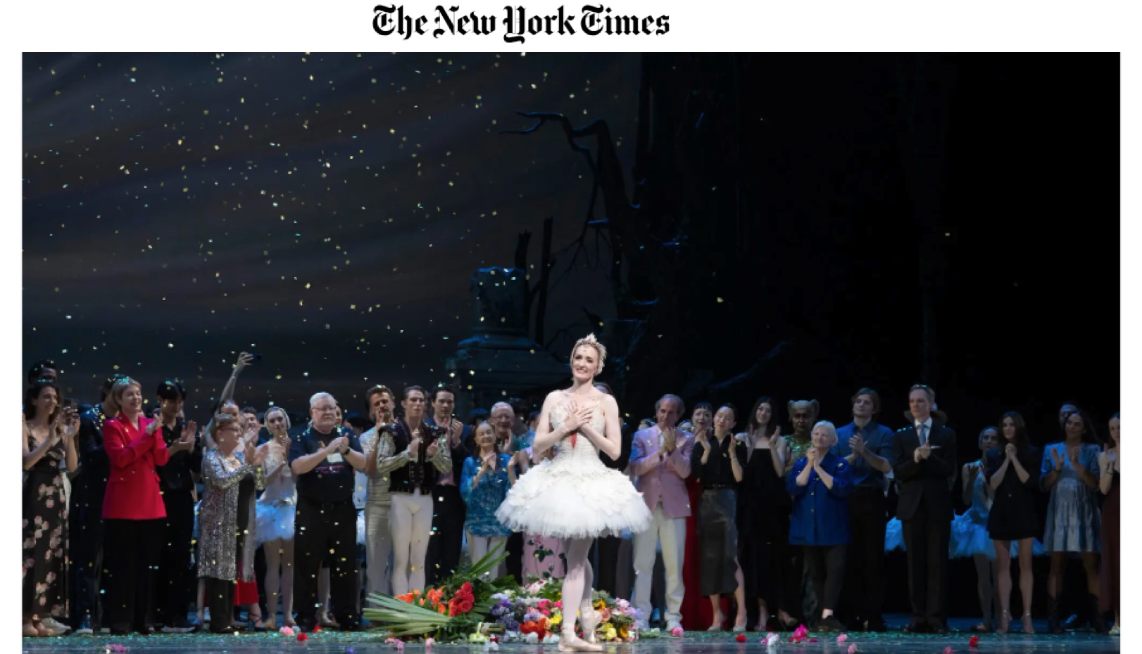 Gillian Murphy on stage with performers and NY Times logo above