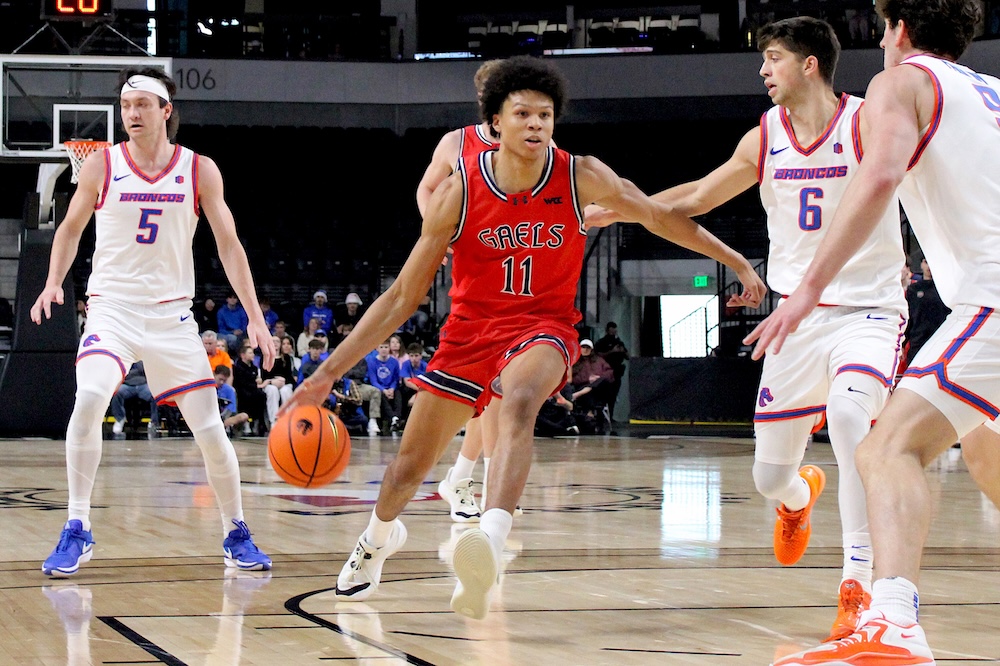 Basketball player Dillan Shaw drives against Boise State in December 2025