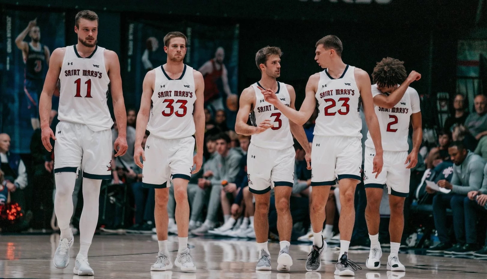 Five men's basketball players walking during game against Gonzaga in 2025