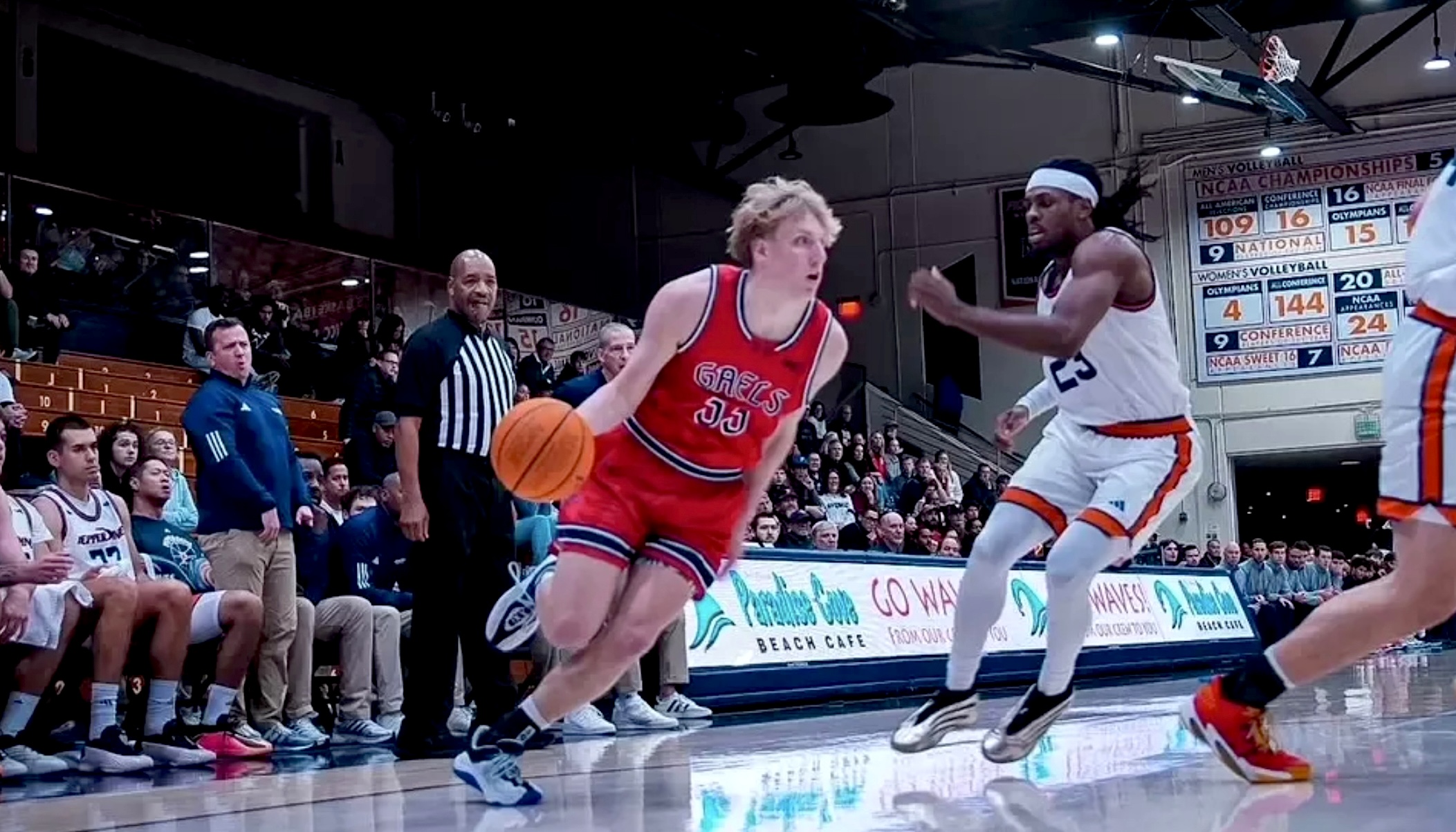 Basketball player Liam Campbell drives against Pepperdine in December 2025