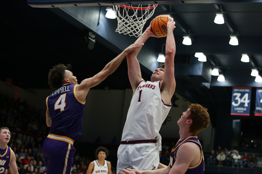 Basketball player Harry Wessels shoots against Northern Iowa in December 2025