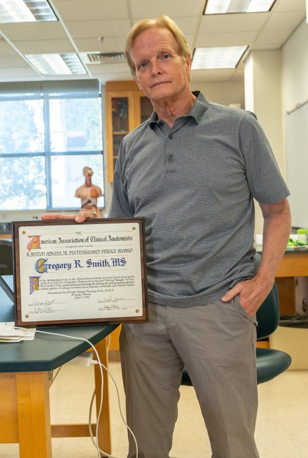 Greg Smith and his AACA plaque