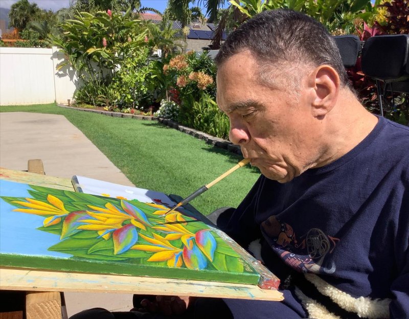 Buster Medeiros mouth painting in Hawaii