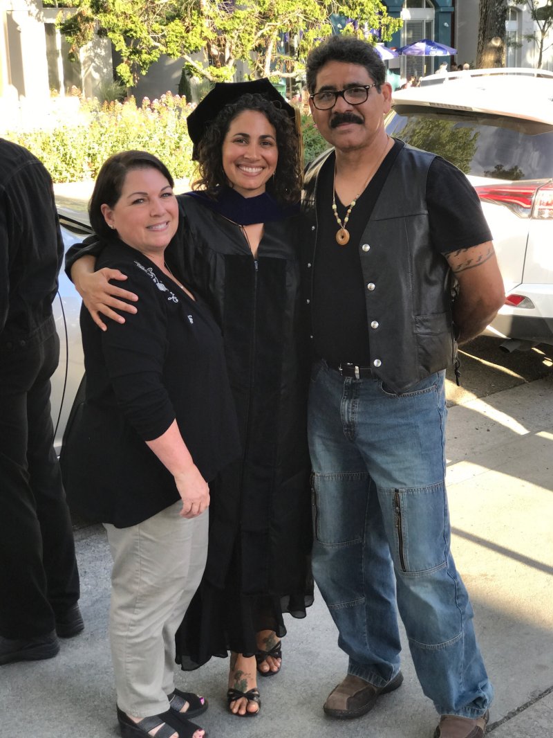 Anastasia Chavez with her parents