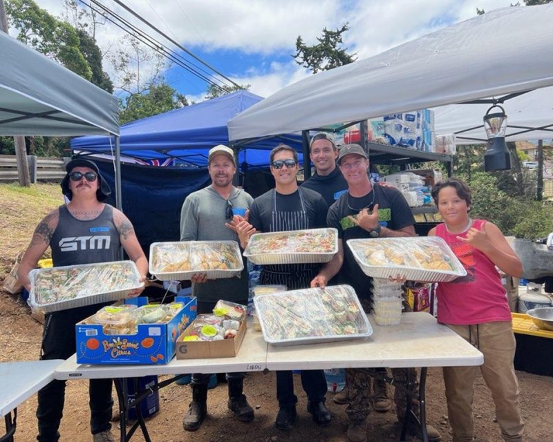 Volunteers serving food in Maui