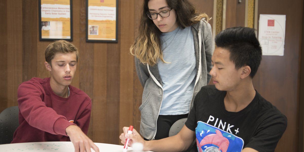 Peer tutoring helping students in the STEM Center
