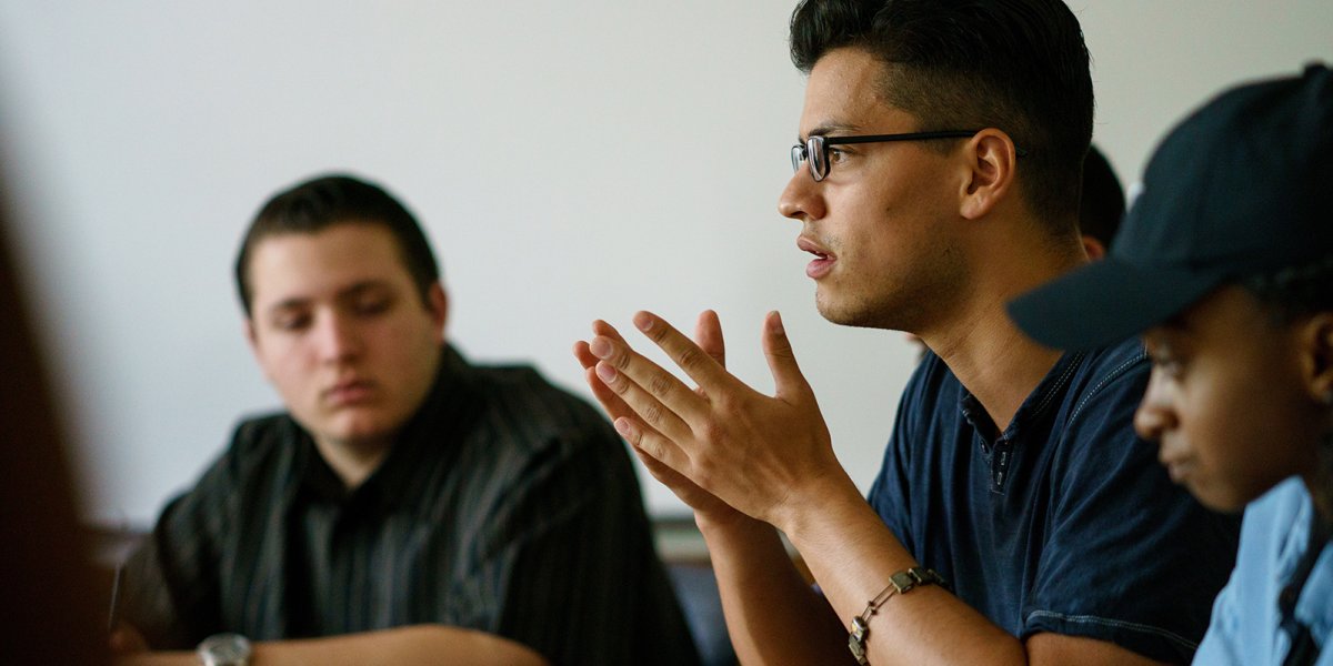 A student speaking in a seminar class