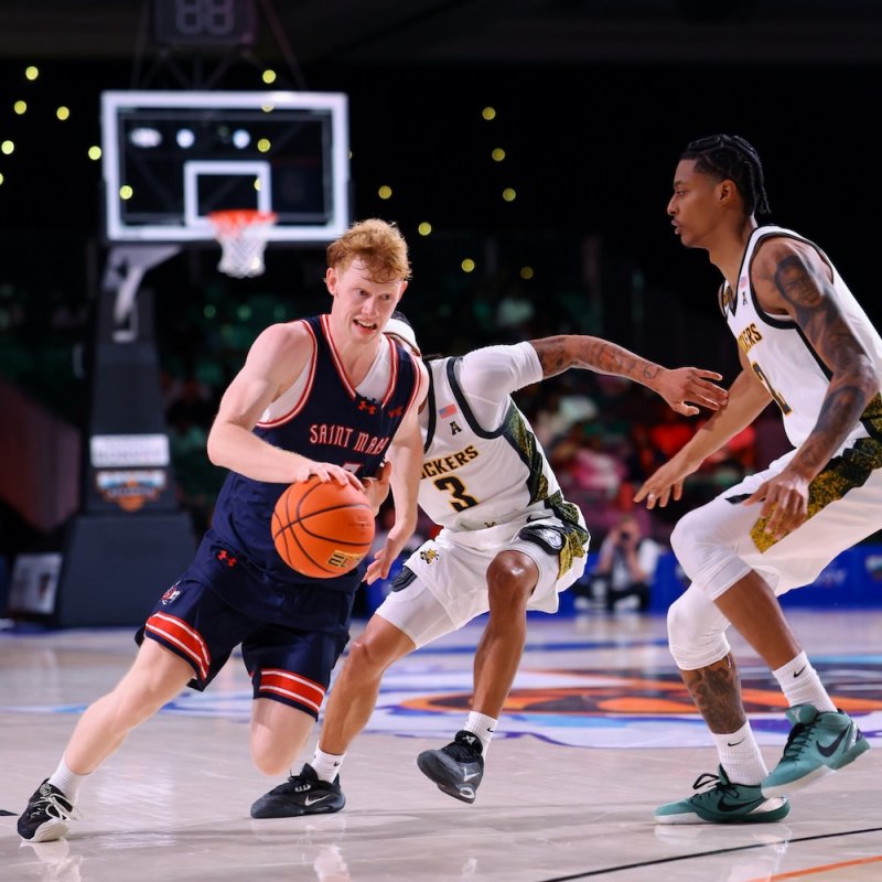 Basketball player Joshua Dent drives against Wichita State in November 2025