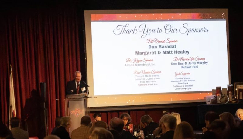 Pat Vincent Dinner 2025 view of room with text on screen