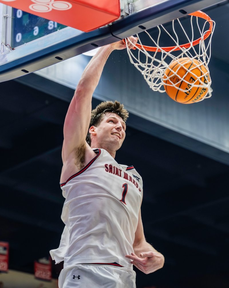 Basketball player Harry Wessels dunks against Santa Clara in February 2026