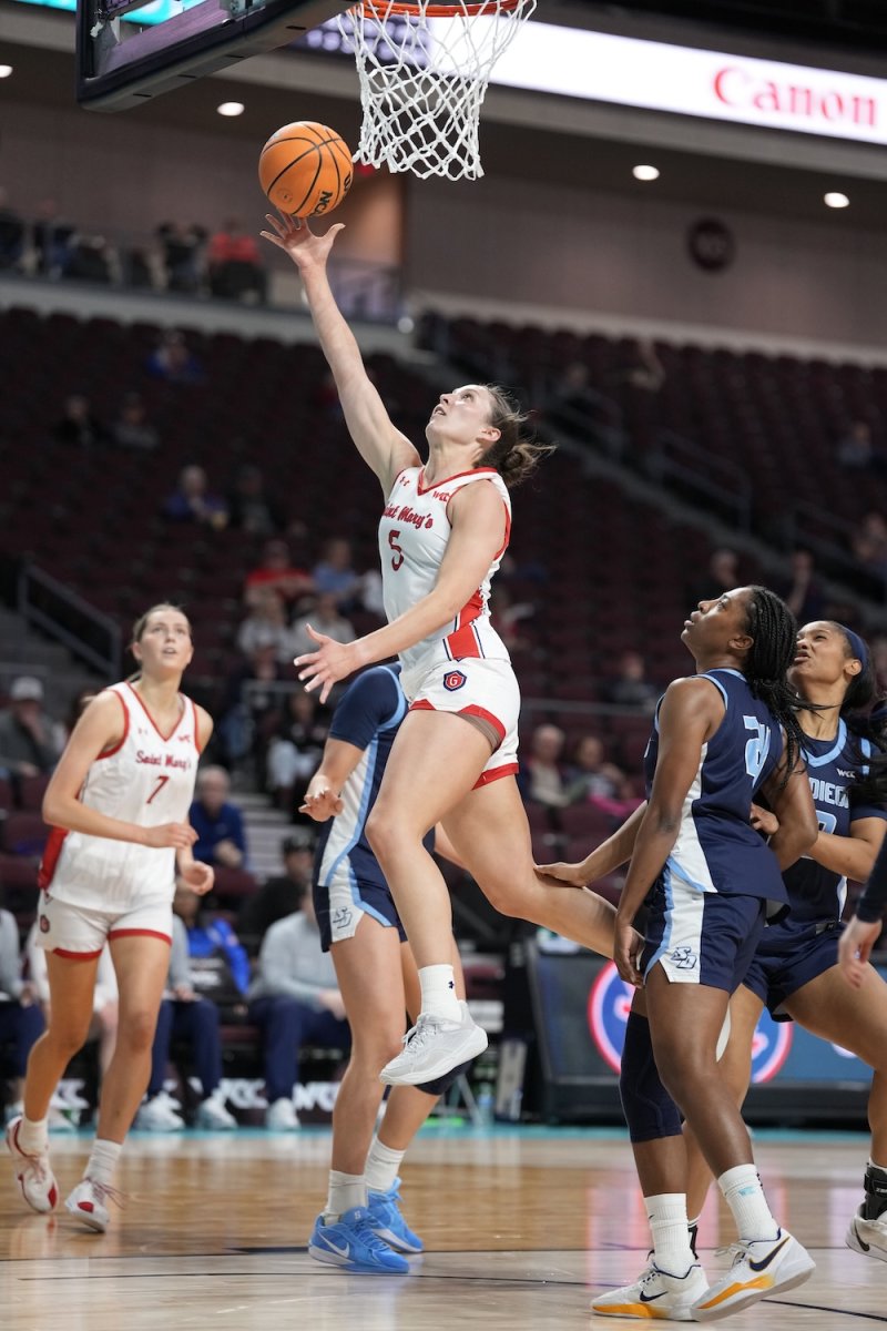 Basketball player Abigail Shoff shoots against San Diego in WCC Tournament 2026