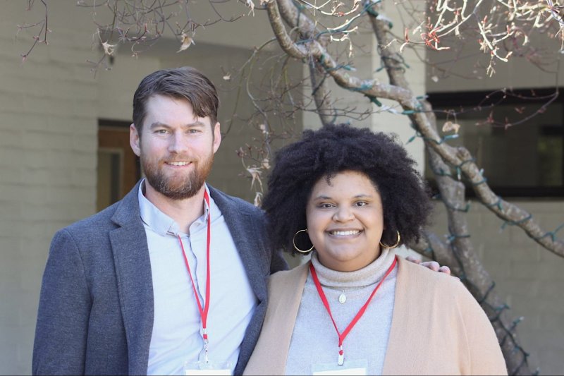 Prof. James McCauley, left, and SMC alum Taylor Odom