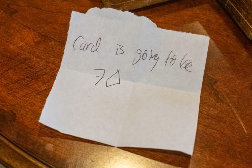 sanjay's prediction of a 7 spade on a piece of paper