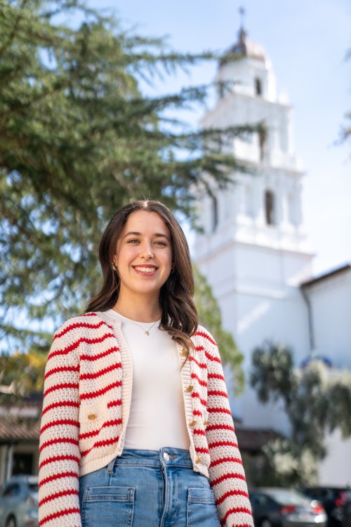 Alejandra Perez stands in front of the Saint Mary's Chapel