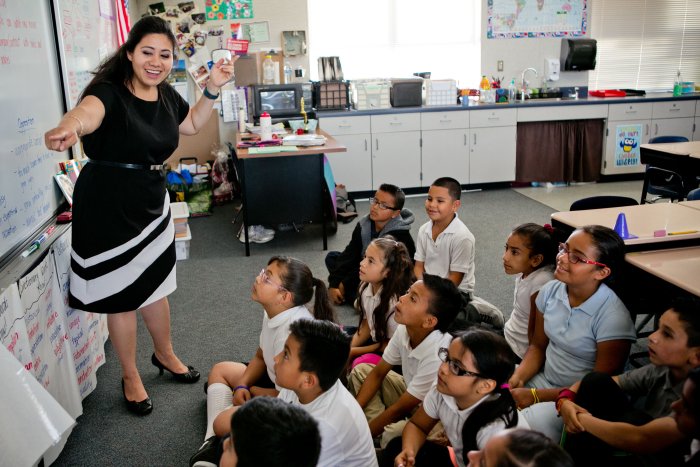A KSOE graduate teaching her class