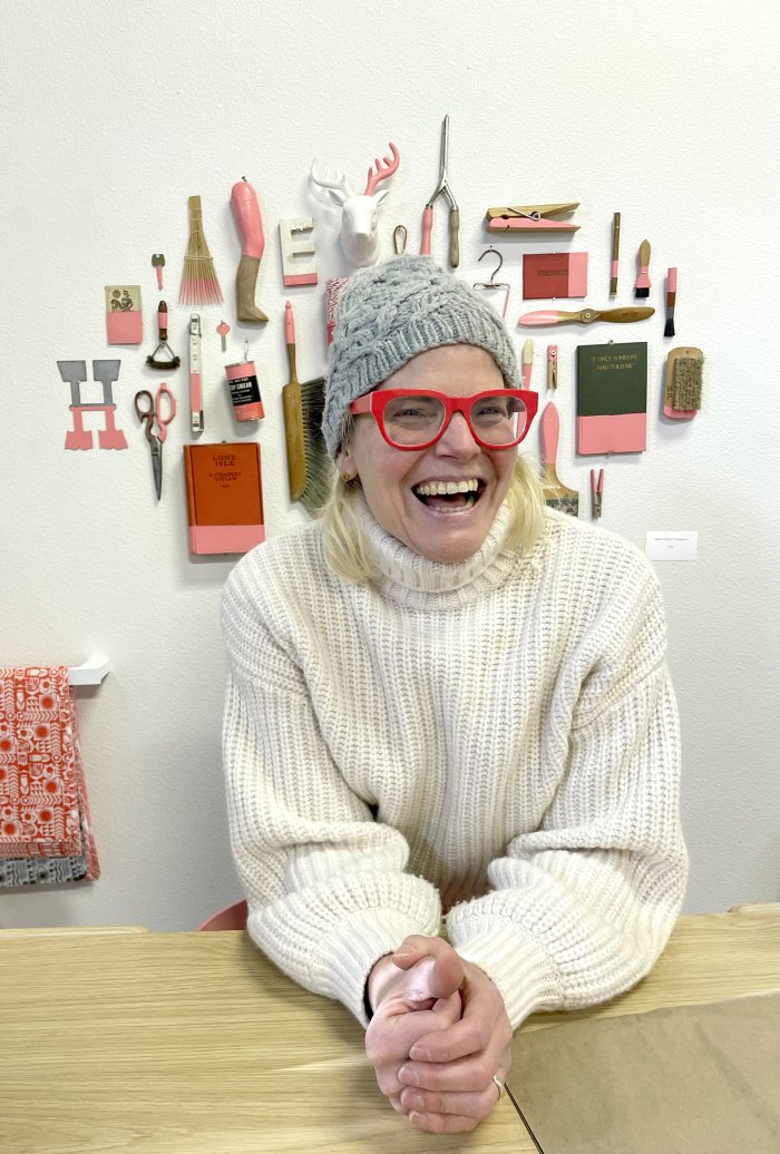 Lisa Congdon smiling in her studio 