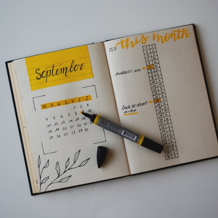 an open journal with yellow highlighting