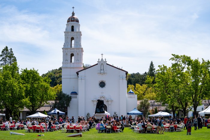 Image of SMC community BBQ on the Chapel Lawn with the Chapel in the background
