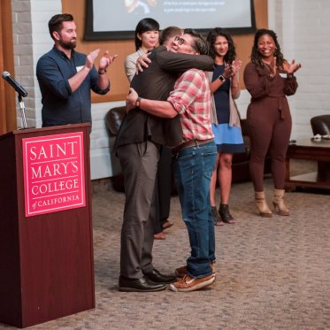 Hugs at the Scholars Reception