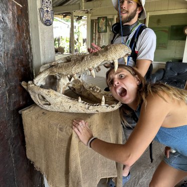 Student with head in skull jaws