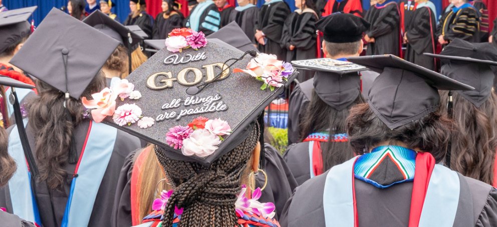 with god message on grad cap