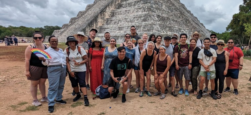 A group in front of an ancient Mexican pyramid