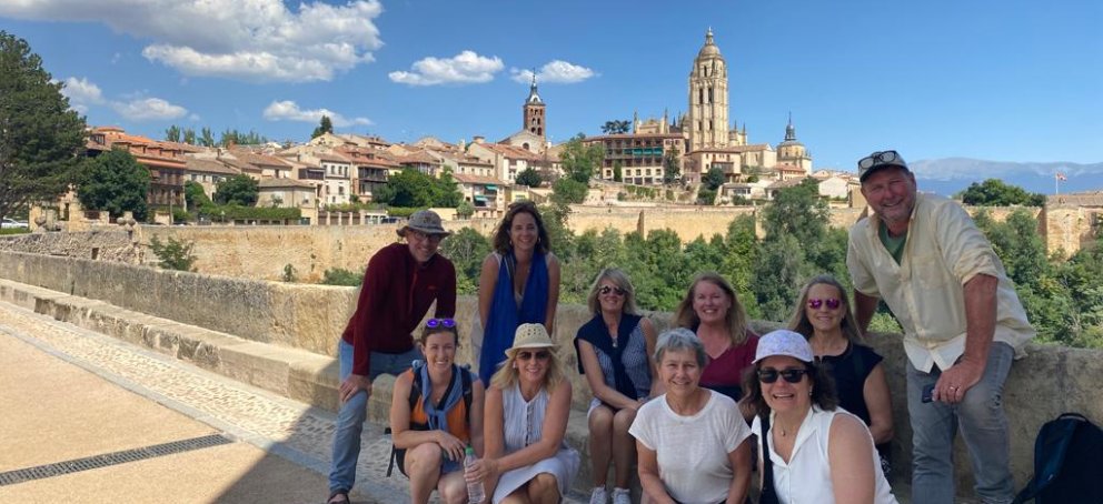 A group smiling in Spain