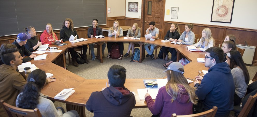 roundtable classroom image with seated students