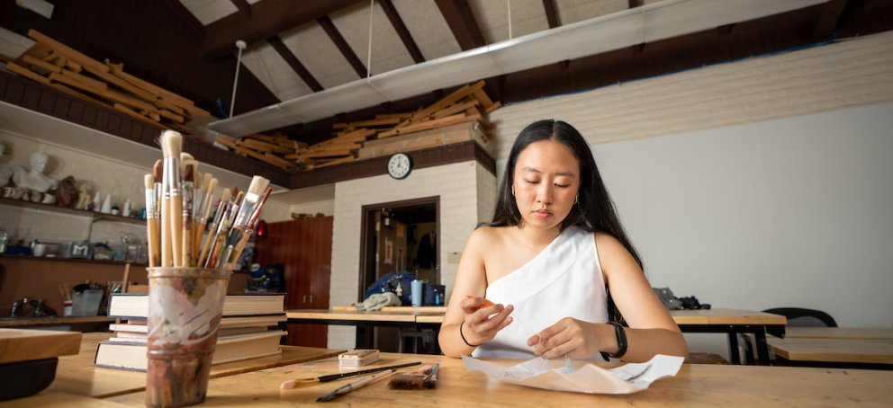 A student making art