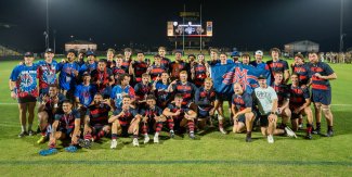 Men's Rugby Team posing as national champs