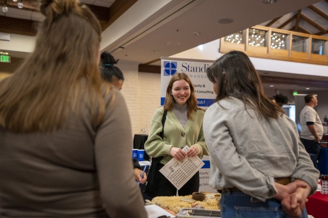Students talking to Standish Management reps