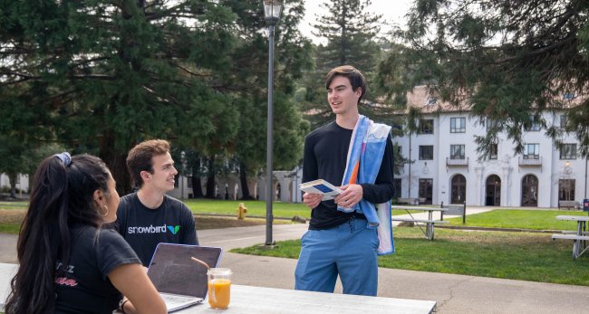 Saint Mary's Data Analytics Degree Students Studying Outdoors on Campus
