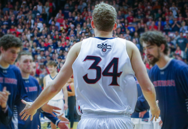 Men's basketball player Jock Landale from behind, with No. 34 on his jersey