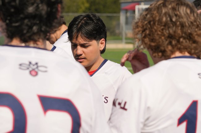 Pondering Thought: Senior Jared Ralleta ‘24 huddled up with his team during half time.